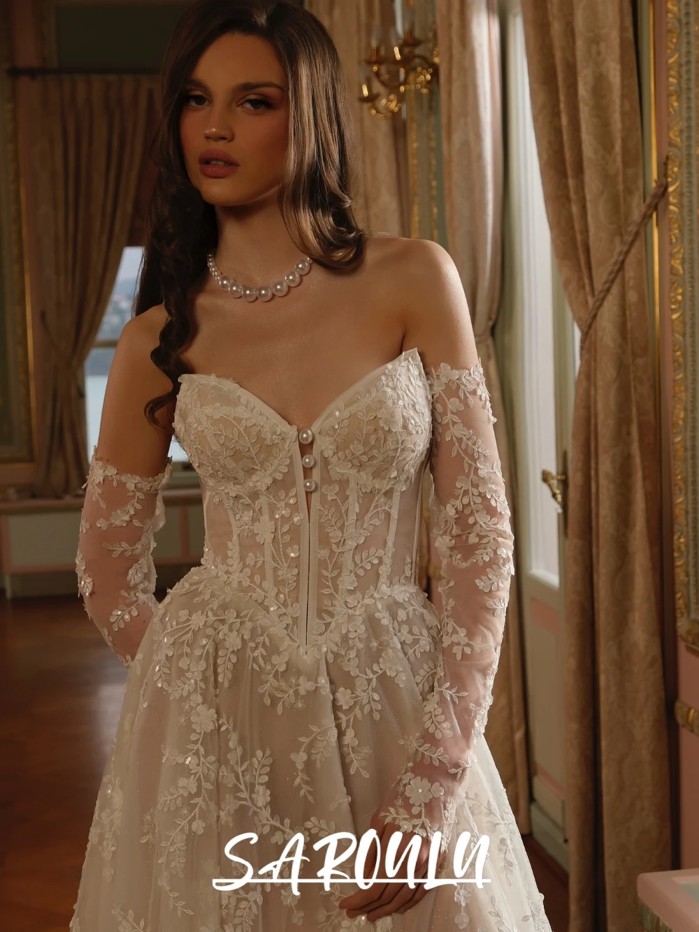 Romantic Sparkling Off Shoulder Wedding Gown Long Lace Sleeves Floral Embroidery & Deep V Back Dress Timeless Brides Customized
Romantic Sparkling Off Shoulder Wedding Gown Long Lace Sleeves Floral Embroidery & Deep V Back Dress Timeless Brides Customized