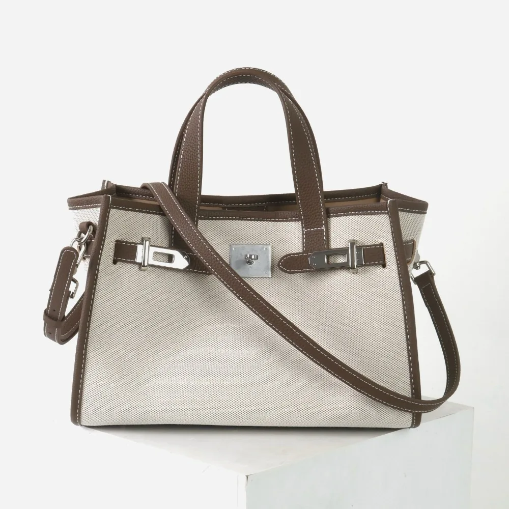 2026 Summer New Commuter Canvas with Women's Bag Tote Bag Texture Unique Fashion Simple Casual Daily Senior Versatile Elegance
2026 Summer New Commuter Canvas with Women's Bag Tote Bag Texture Unique Fashion Simple Casual Daily Senior Versatile Elegance