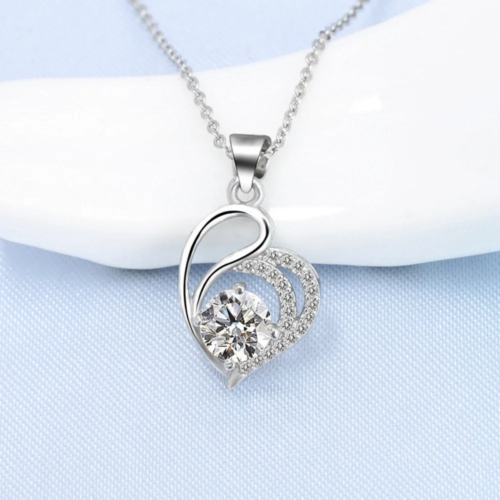 Ожерелье из стерлингового серебра 925 пробы, модное ожерелье с подвеской в форме сердца и циркона и бриллианта, повседневная вечеринка, юбилей, свадьба, праздник, подарок
Ожерелье из стерлингового серебра 925 пробы, модное ожерелье с подвеской в форме сердца и циркона и бриллианта, повседневная вечеринка, юбилей, свадьба, праздник, подарок