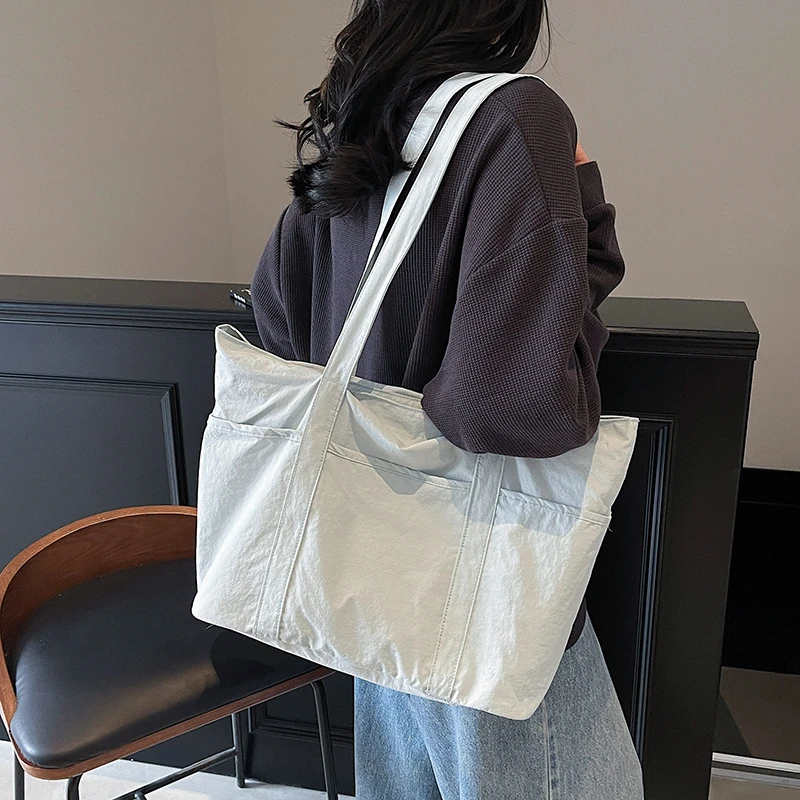 Fashionable and casual canvas bag 2025 new trendy versatile large capacity commuting shoulder bag portable travel women's bag
Fashionable and casual canvas bag 2025 new trendy versatile large capacity commuting shoulder bag portable travel women's bag