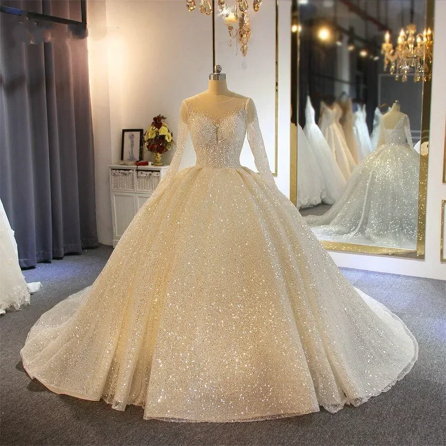 Customized Ballgown Spark Beads Wedding Dresses Sheer Jewel Neck Sequins Long Sleeves Corset Back Plus Size Bridal Gowns
Customized Ballgown Spark Beads Wedding Dresses Sheer Jewel Neck Sequins Long Sleeves Corset Back Plus Size Bridal Gowns