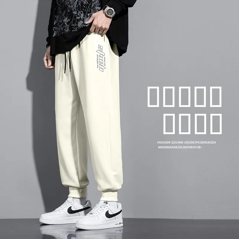 Мужские повседневные брюки свободного кроя для молодежи, весенне-осенние, новые модные длинные брюки с манжетами, универсальная спортивная одежда
Мужские повседневные брюки свободного кроя для молодежи, весенне-осенние, новые модные длинные брюки с манжетами, универсальная спортивная одежда