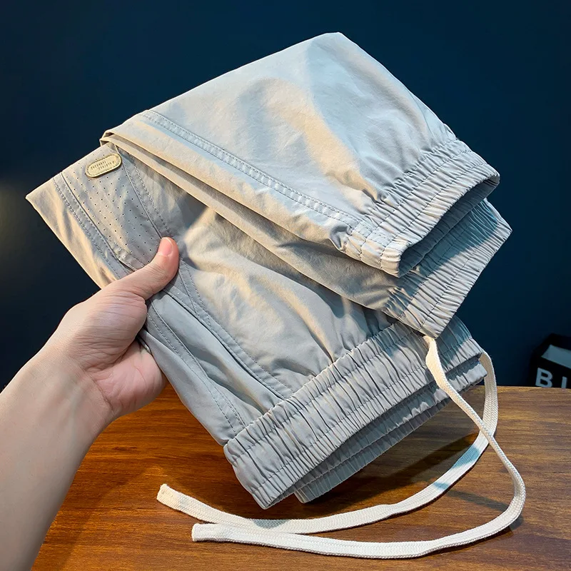 Solid Color Casual Pants Men's Summer Breathable Loose Elastic Straight Cargo Elastic Waist Drawstring Sports Pants
Solid Color Casual Pants Men's Summer Breathable Loose Elastic Straight Cargo Elastic Waist Drawstring Sports Pants