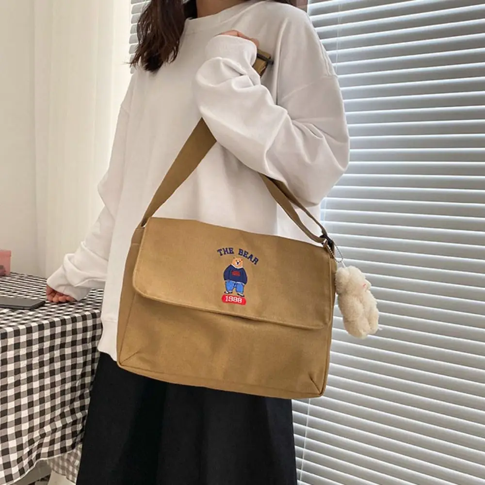 Simple Canvas Embroidery Bear Shoulder Bag Cute Large Capacity Crossbody Bag Japanese Style Cartoon Tote Bag Travel
Simple Canvas Embroidery Bear Shoulder Bag Cute Large Capacity Crossbody Bag Japanese Style Cartoon Tote Bag Travel