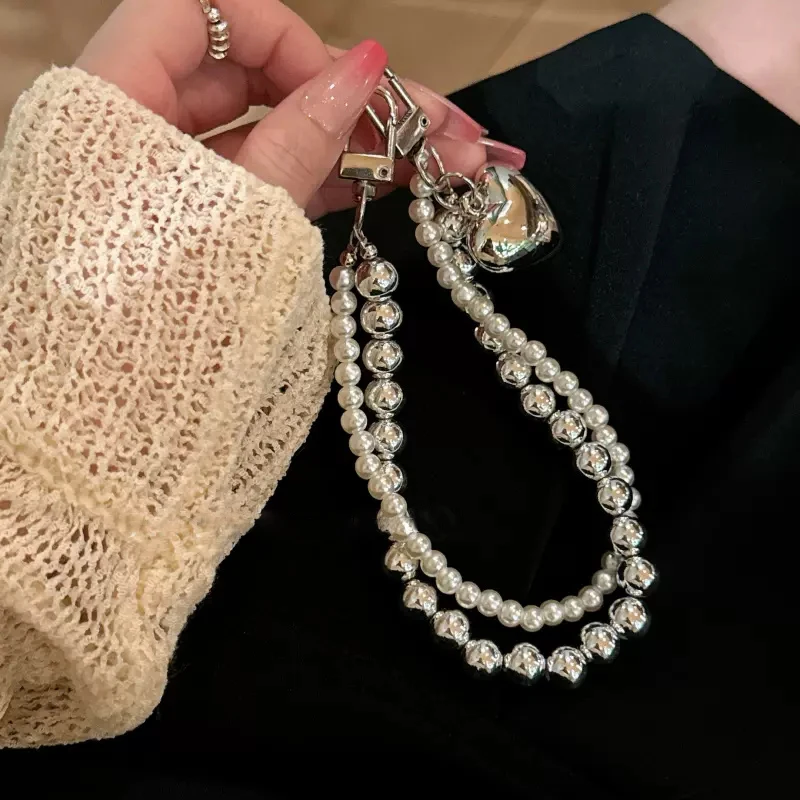 Luxury Bow Pearl Beaded Keychain Bracelet Lanyard Phone ZY Charm Cute Love Heart Mobile Phone Camera Wrist Strap Anti-Lost Chain
Luxury Bow Pearl Beaded Keychain Bracelet Lanyard Phone ZY Charm Cute Love Heart Mobile Phone Camera Wrist Strap Anti-Lost Chain