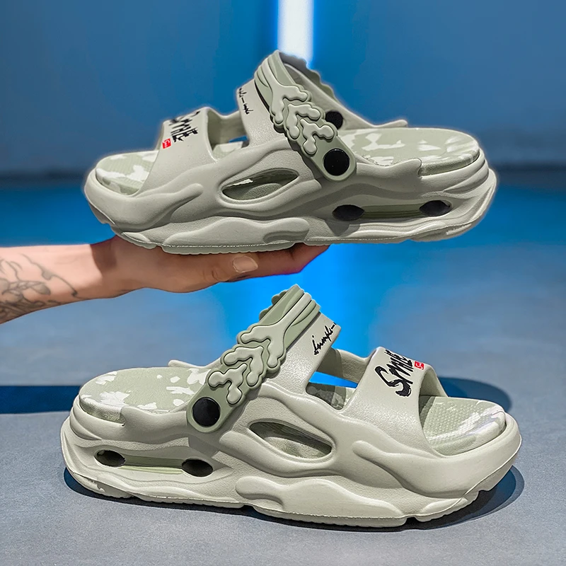 Мужские летние модные брендовые уличные тапочки, противоскользящие тапочки, прогулочные ощущения, крутые сандалии для вождения, два пользователя, уличные ...
Мужские летние модные брендовые уличные тапочки, противоскользящие тапочки, прогулочные ощущения, крутые сандалии для вождения, два пользователя, уличные ...