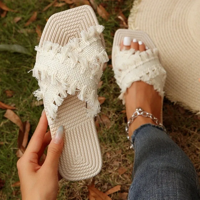 Summer women shoes New Bohemian slippers for women in summer comfortable beach sandals with tassel open toe flat bottom Sandals
Summer women shoes New Bohemian slippers for women in summer comfortable beach sandals with tassel open toe flat bottom Sandals