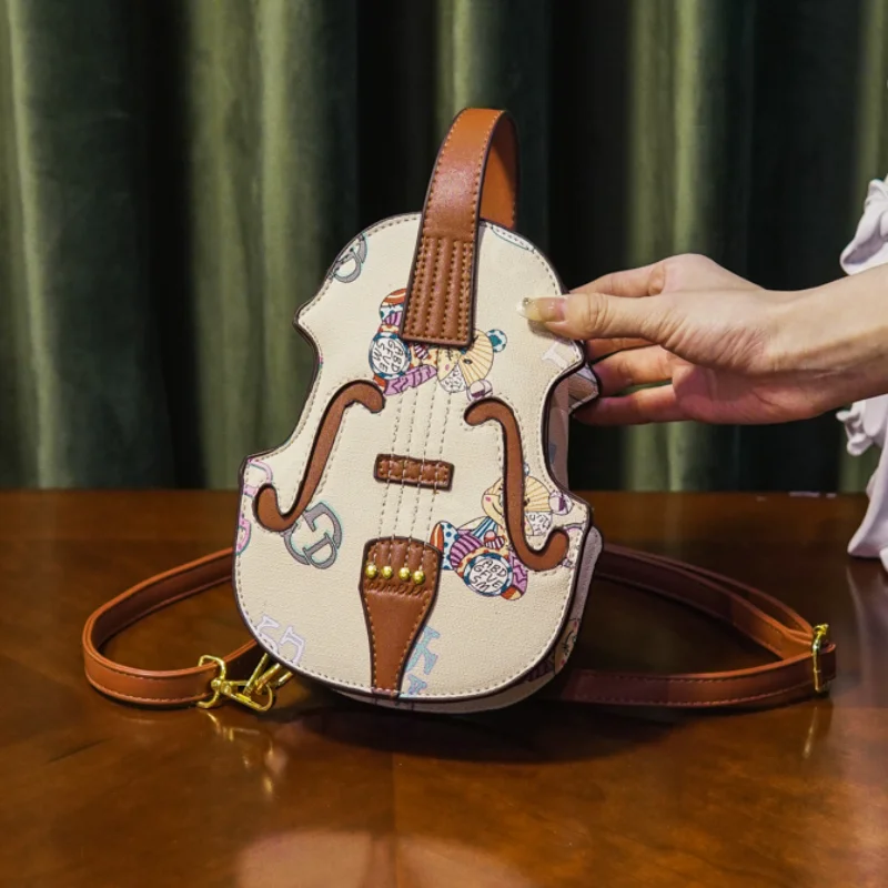 Personality Violin Bags for Women 2024 New Fashion Cute Shoulder Bag Woman High Quality Leather Cartoon Printing Luxury Handbag
Personality Violin Bags for Women 2024 New Fashion Cute Shoulder Bag Woman High Quality Leather Cartoon Printing Luxury Handbag