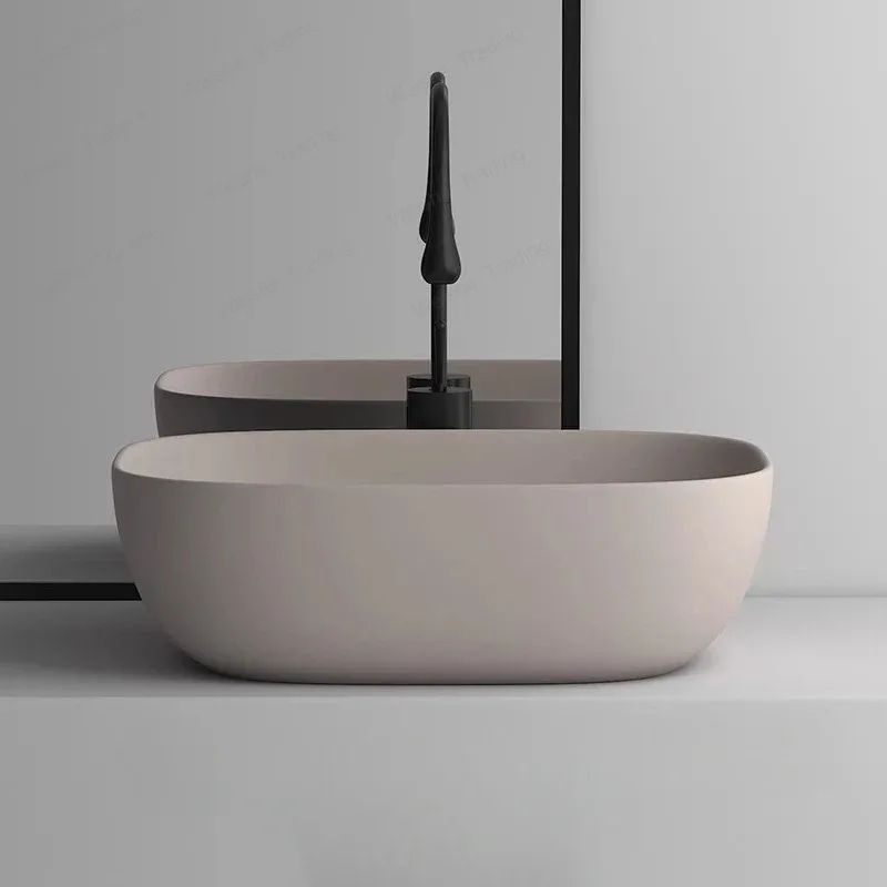 Modern Ceramic Bathroom Sinks for Kitchen Oval Deepened Matte Basin Light Luxury Khaki Easy To Clean Design Sink for Courtyard
Modern Ceramic Bathroom Sinks for Kitchen Oval Deepened Matte Basin Light Luxury Khaki Easy To Clean Design Sink for Courtyard