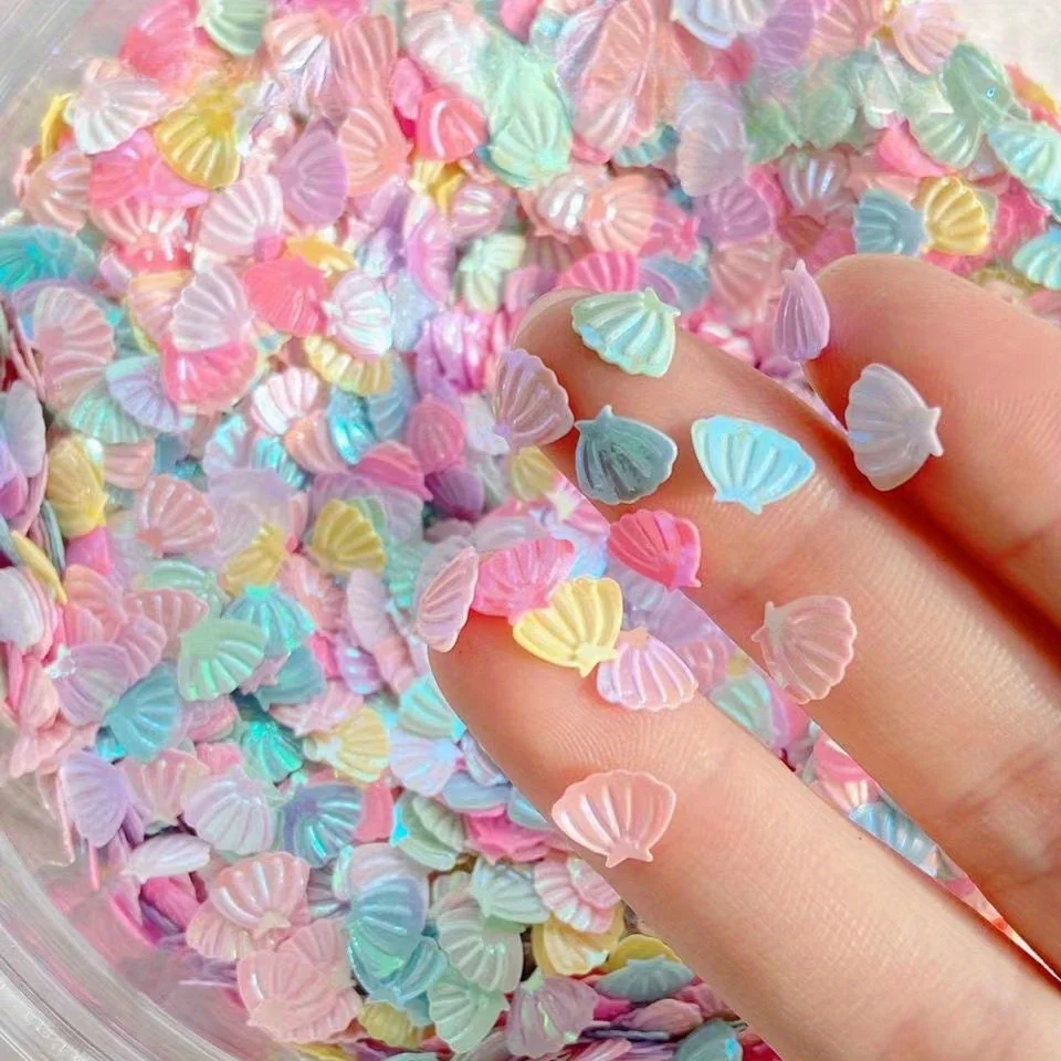 10g/pack 6mm Plastic Small Shell Nail Art Sequins Decorative Flash Nail Art Phone Case Hairpin Diy Decoration Accessories
10g/pack 6mm Plastic Small Shell Nail Art Sequins Decorative Flash Nail Art Phone Case Hairpin Diy Decoration Accessories