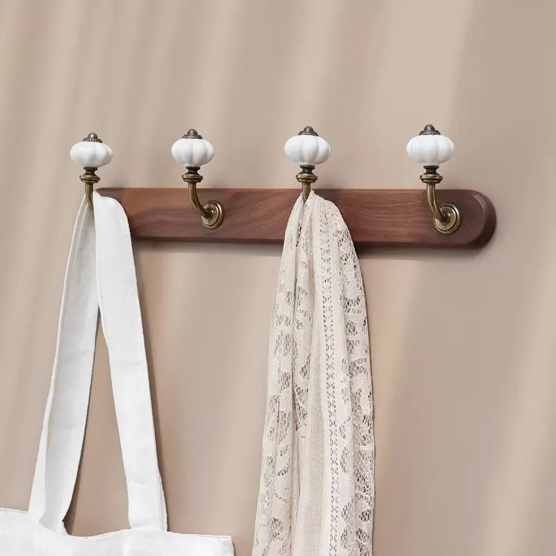 Wall Mounted Walnut Clothes Hooks Solid Wood Coat Hook for Hallway Laundry Room Ceramic Decor Entryway Organizer Hats Holders
Wall Mounted Walnut Clothes Hooks Solid Wood Coat Hook for Hallway Laundry Room Ceramic Decor Entryway Organizer Hats Holders