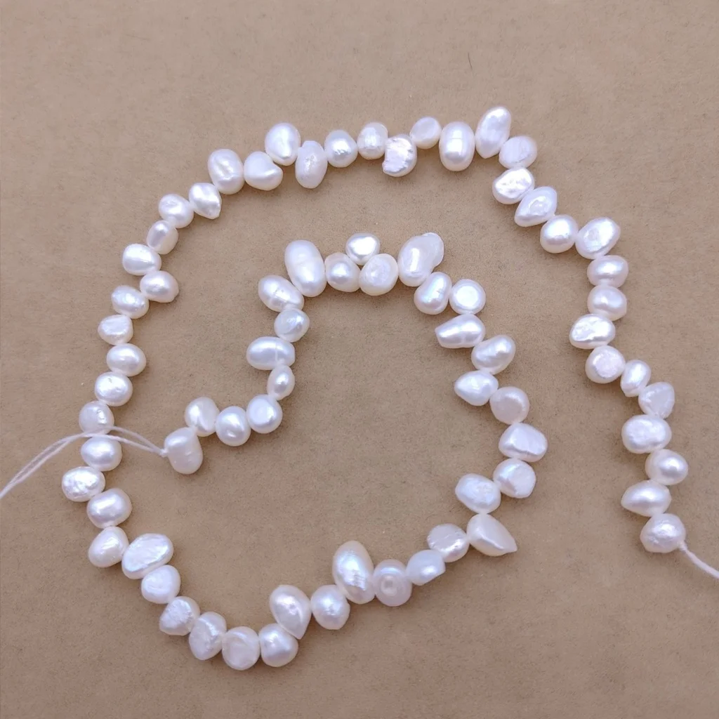 5-6mm white top drilled hole Baroque freshwater pearl necklace semi-finished DIY jewelry
5-6mm white top drilled hole Baroque freshwater pearl necklace semi-finished DIY jewelry