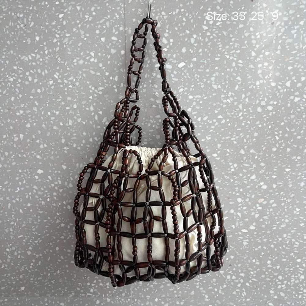 2026 New Handwoven Bag String Wooden Beads Large Capacity Portable Shoulder Niche Hollow Versatile Underarm Mother and Child
2026 New Handwoven Bag String Wooden Beads Large Capacity Portable Shoulder Niche Hollow Versatile Underarm Mother and Child