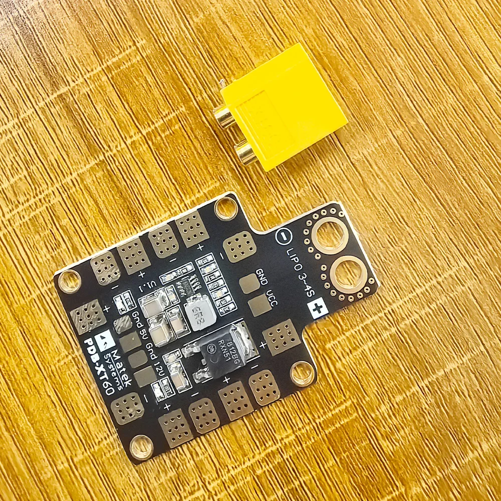 MATEK Mini XT60 Power Hub PDB 5 В/12 В BEC RC FPV Drone Плата распределения питания для квадрокоптеров QAV210 QAV-R QAV-X
MATEK Mini XT60 Power Hub PDB 5 В/12 В BEC RC FPV Drone Плата распределения питания для квадрокоптеров QAV210 QAV-R QAV-X