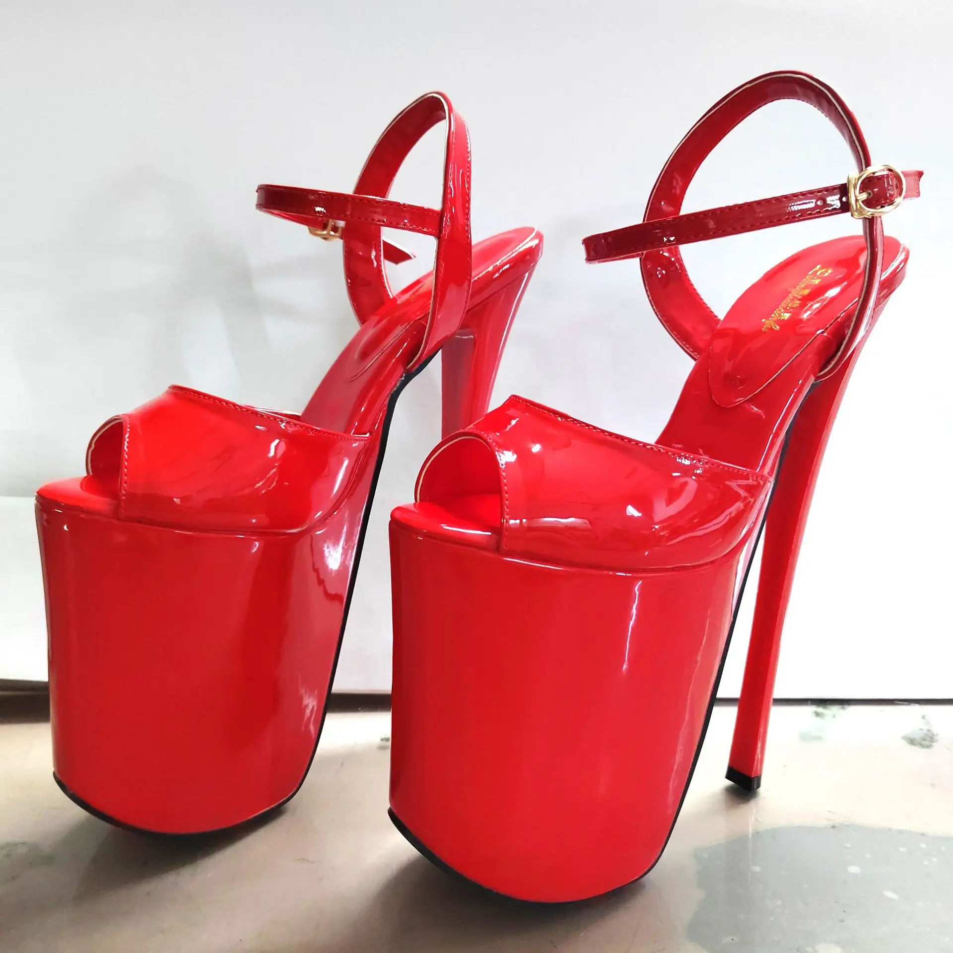 Босоножки на тонком высоком каблуке толщиной 22 см, женская обувь с пряжкой 9 дюймов, летние свадебные туфли на высоком каблуке с открытым носком, размер 34-50 
Босоножки на тонком высоком каблуке толщиной 22 см, женская обувь с пряжкой 9 дюймов, летние свадебные туфли на высоком каблуке с открытым носком, размер 34-50