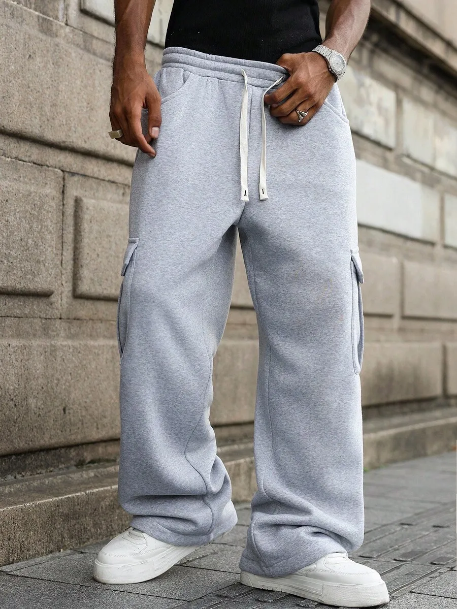 Grey Oversized Cargo Sweatpants For Men, Baggy Wide-Leg Joggers Ideal For Streetwear, Casual Wear And Festivals
Grey Oversized Cargo Sweatpants For Men, Baggy Wide-Leg Joggers Ideal For Streetwear, Casual Wear And Festivals
