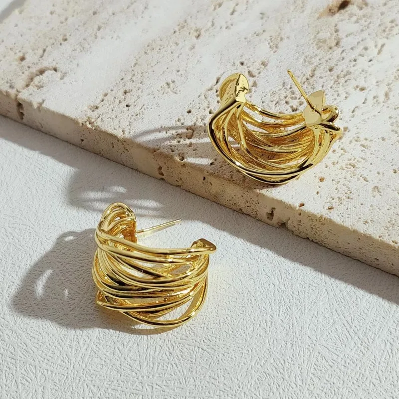 Electroplating Luxury Trend Retro Premium Style Gold Circle Multi-layer Hollow Winding Line Earrings Earrings
Electroplating Luxury Trend Retro Premium Style Gold Circle Multi-layer Hollow Winding Line Earrings Earrings
