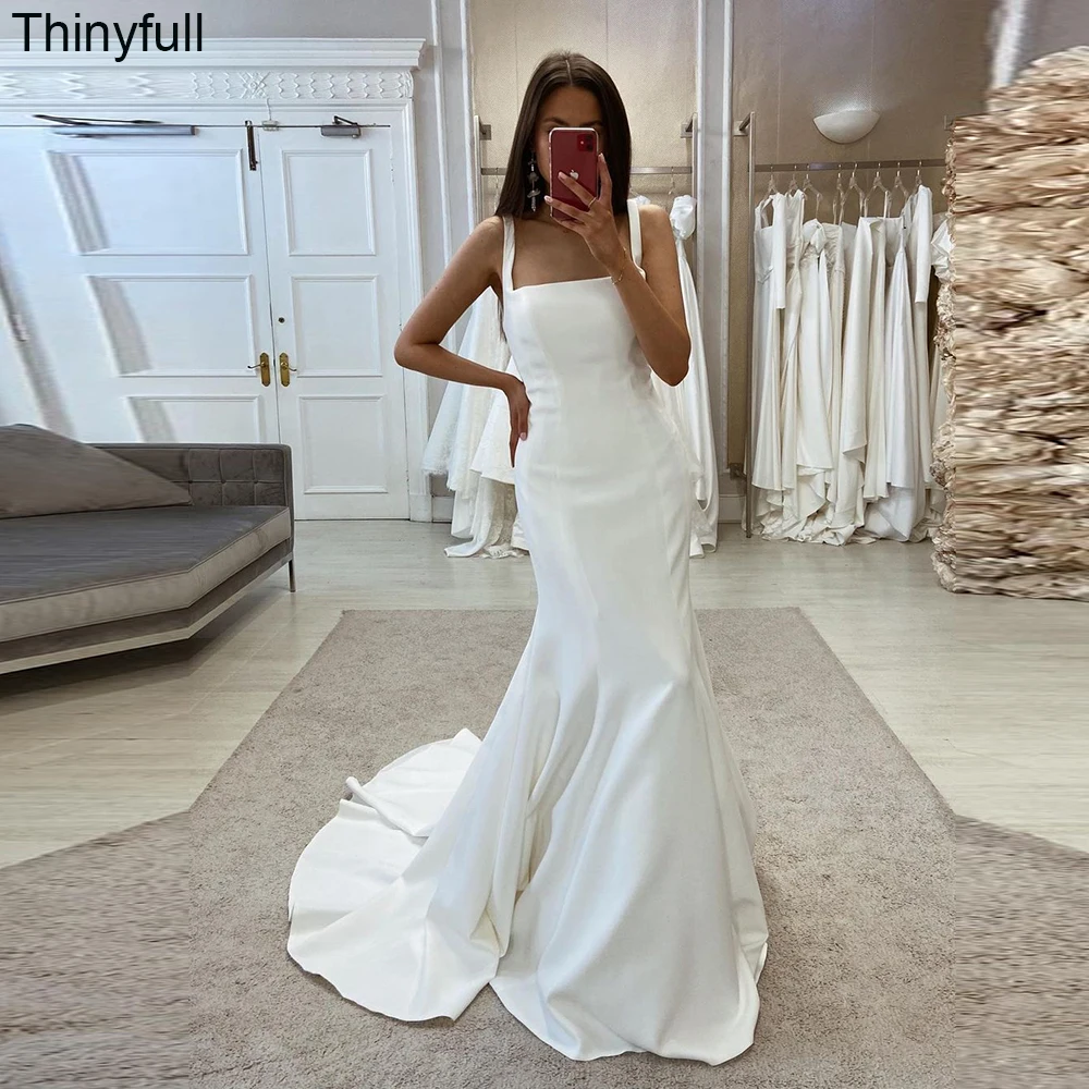 Thinyfull Elegant Mermaid White Wedding Dresses Sleeveless Square Collar Spaghetti Straps Bride Dresses Long Bridal Gown 2023
Thinyfull Elegant Mermaid White Wedding Dresses Sleeveless Square Collar Spaghetti Straps Bride Dresses Long Bridal Gown 2023
