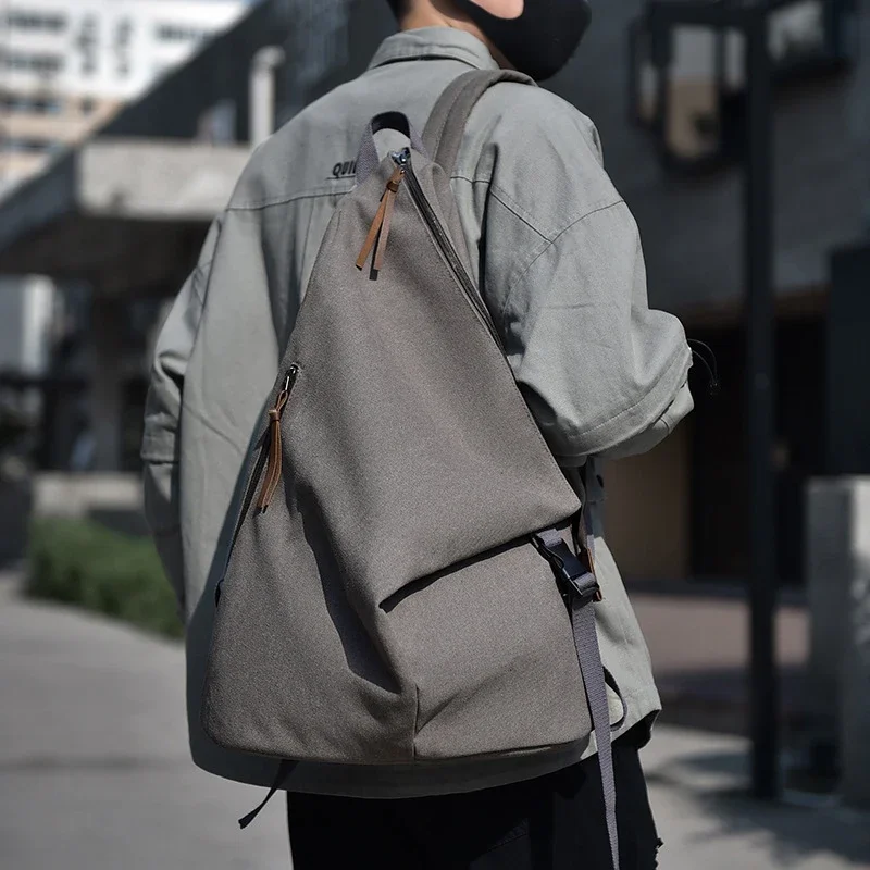 Новый модный дизайн, холщовый треугольный рюкзак, повседневный мужской рюкзак, износостойкая дорожная сумка, большой школьный рюкзак
Новый модный дизайн, холщовый треугольный рюкзак, повседневный мужской рюкзак, износостойкая дорожная сумка, большой школьный рюкзак