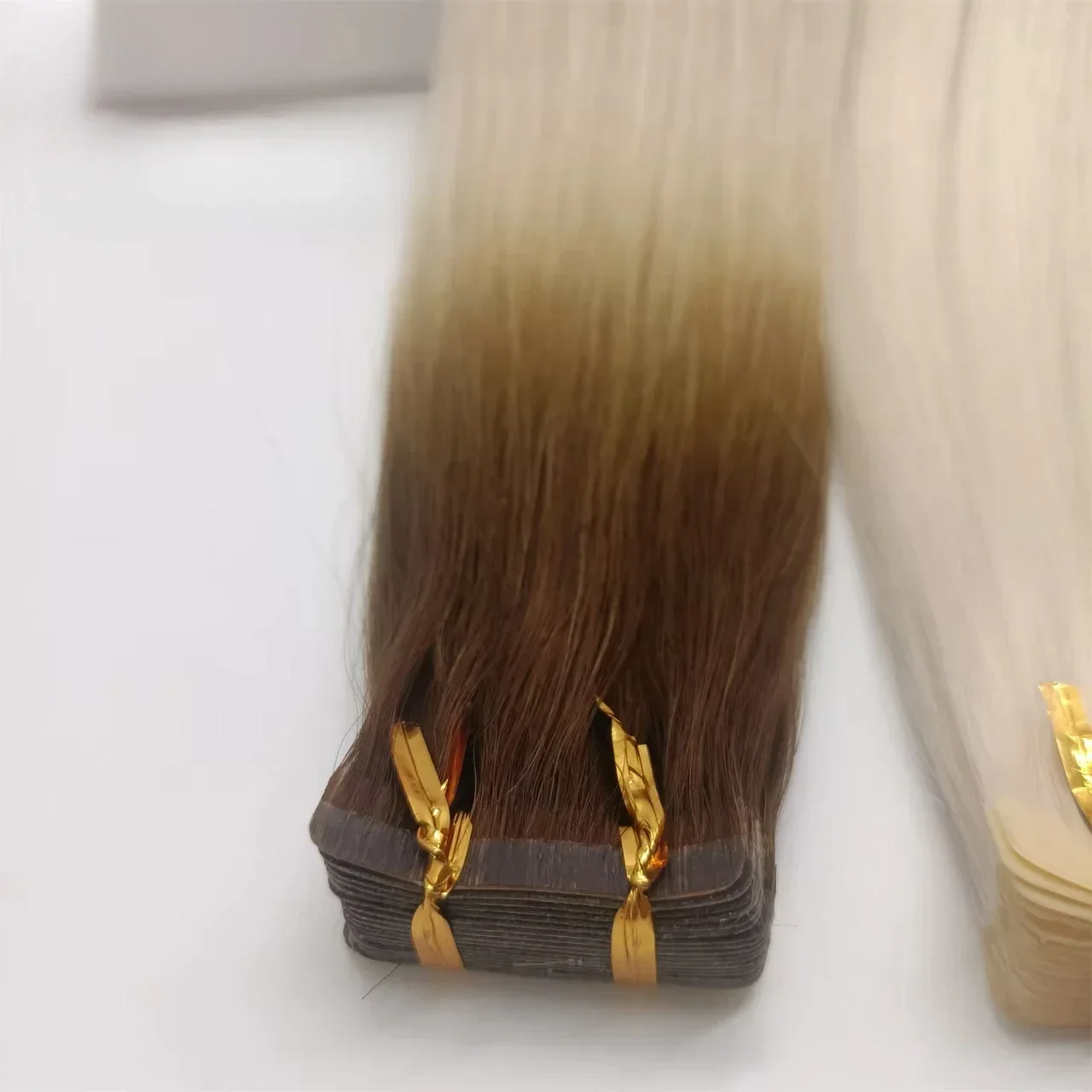 Hair extensions tape in hair 100% human hair invisible tape hot sell news double deck tape
Hair extensions tape in hair 100% human hair invisible tape hot sell news double deck tape