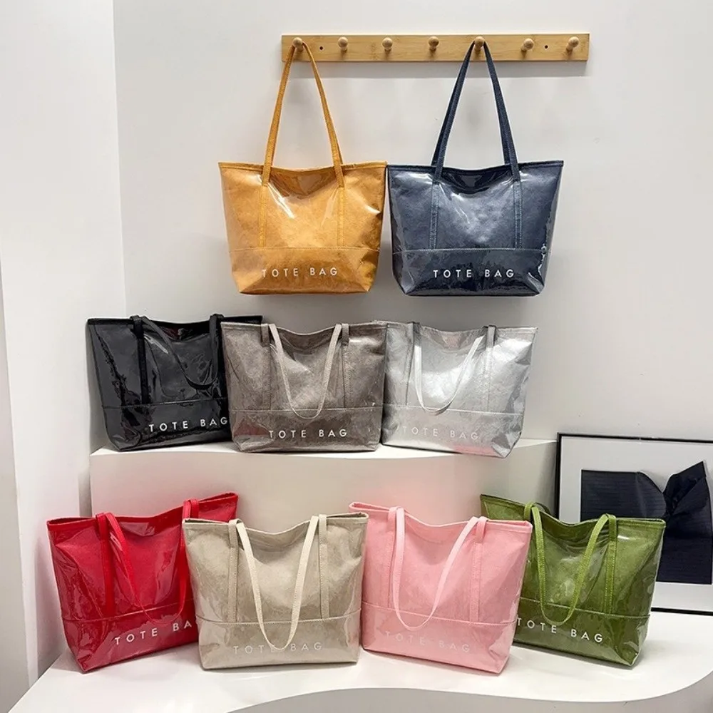 Waterproof PVC Tote Bag Solid Color Multi Function Transparent Jelly Bag Large Capacity Shoulder Bag Letter Prints Handbags
Waterproof PVC Tote Bag Solid Color Multi Function Transparent Jelly Bag Large Capacity Shoulder Bag Letter Prints Handbags