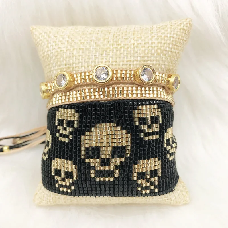 Beaded bracelet Design Retro Tide Skull Zircon Hand knitting Play tricks Bohemia Adjustable Simple Rice bead bracelet set
Beaded bracelet Design Retro Tide Skull Zircon Hand knitting Play tricks Bohemia Adjustable Simple Rice bead bracelet set