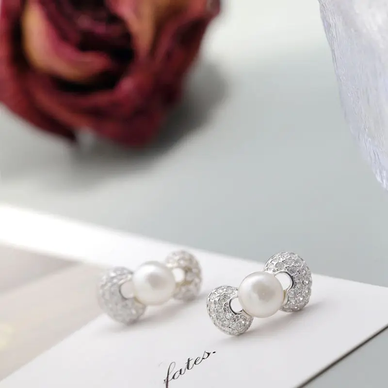 Элегантные очаровательные серьги из стерлингового серебра 925 пробы с бантом, инкрустированные натуральным пресноводным жемчугом, современные минималистичные ювелирные изделия
Элегантные очаровательные серьги из стерлингового серебра 925 пробы с бантом, инкрустированные натуральным пресноводным жемчугом, современные минималистичные ювелирные изделия