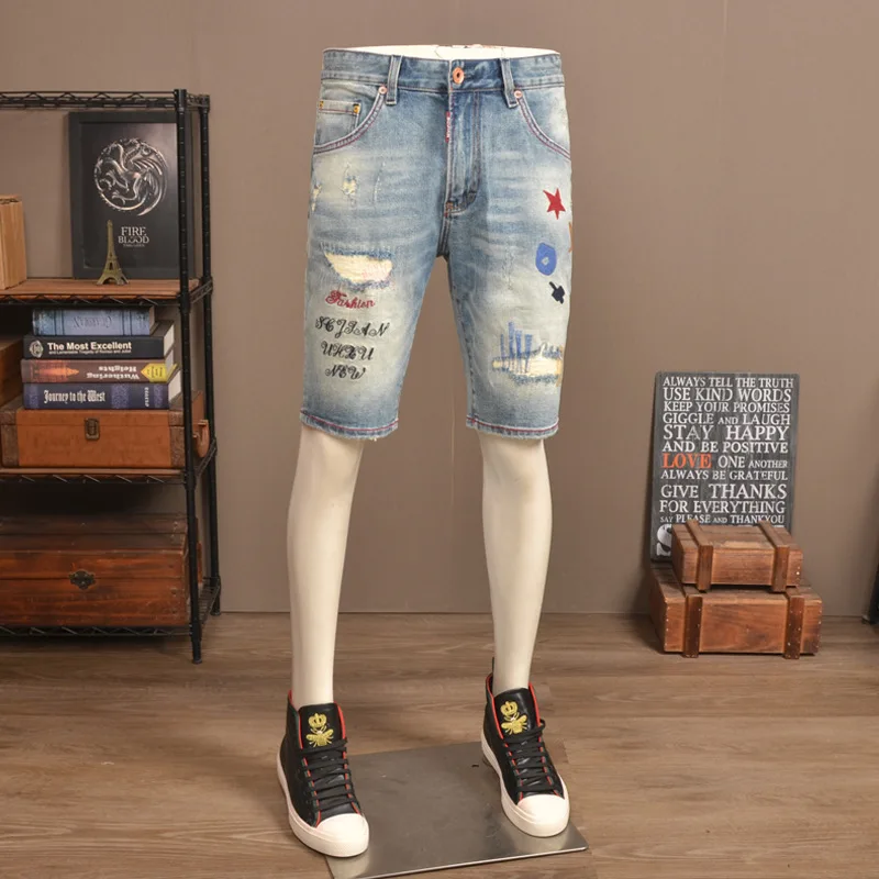 Summer ripped five quarter jeans men's stretch straight leg trendy brand scratch embroidered high-end casual shorts
Summer ripped five quarter jeans men's stretch straight leg trendy brand scratch embroidered high-end casual shorts