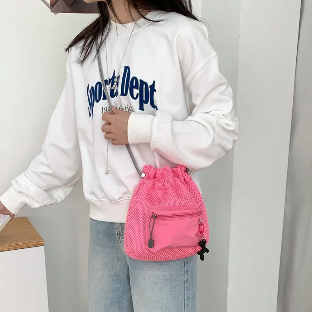Korean Style Drawstring Bucket Bag Handbag Purse Folded Nylon Shoulder Bag Mobile Phone Bag Solid Color Small Crossbody Bag
Korean Style Drawstring Bucket Bag Handbag Purse Folded Nylon Shoulder Bag Mobile Phone Bag Solid Color Small Crossbody Bag