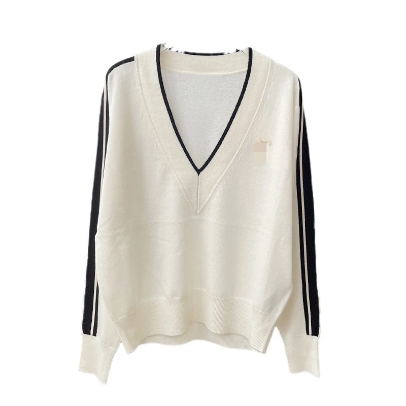 French fashion soft sweater women's wear, contrasting black edge V-neck pullover sweater
French fashion soft sweater women's wear, contrasting black edge V-neck pullover sweater