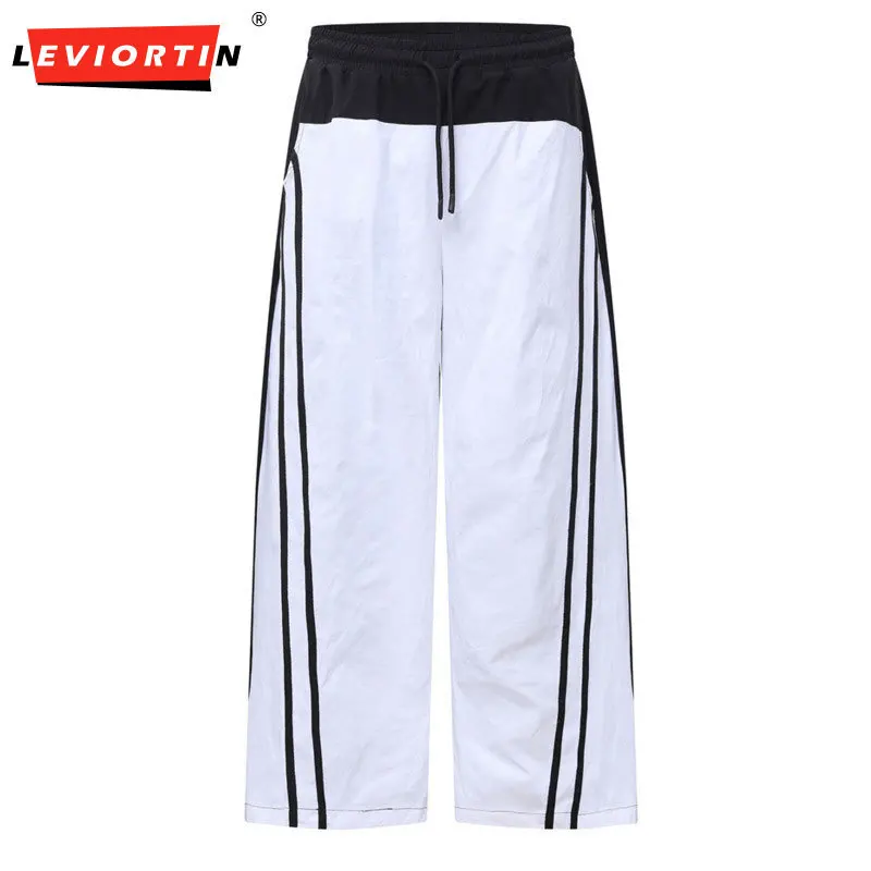 Men's personalized niche design sense color blocked three bar wide leg straight tube contrasting splicing sports casual pants
Men's personalized niche design sense color blocked three bar wide leg straight tube contrasting splicing sports casual pants
