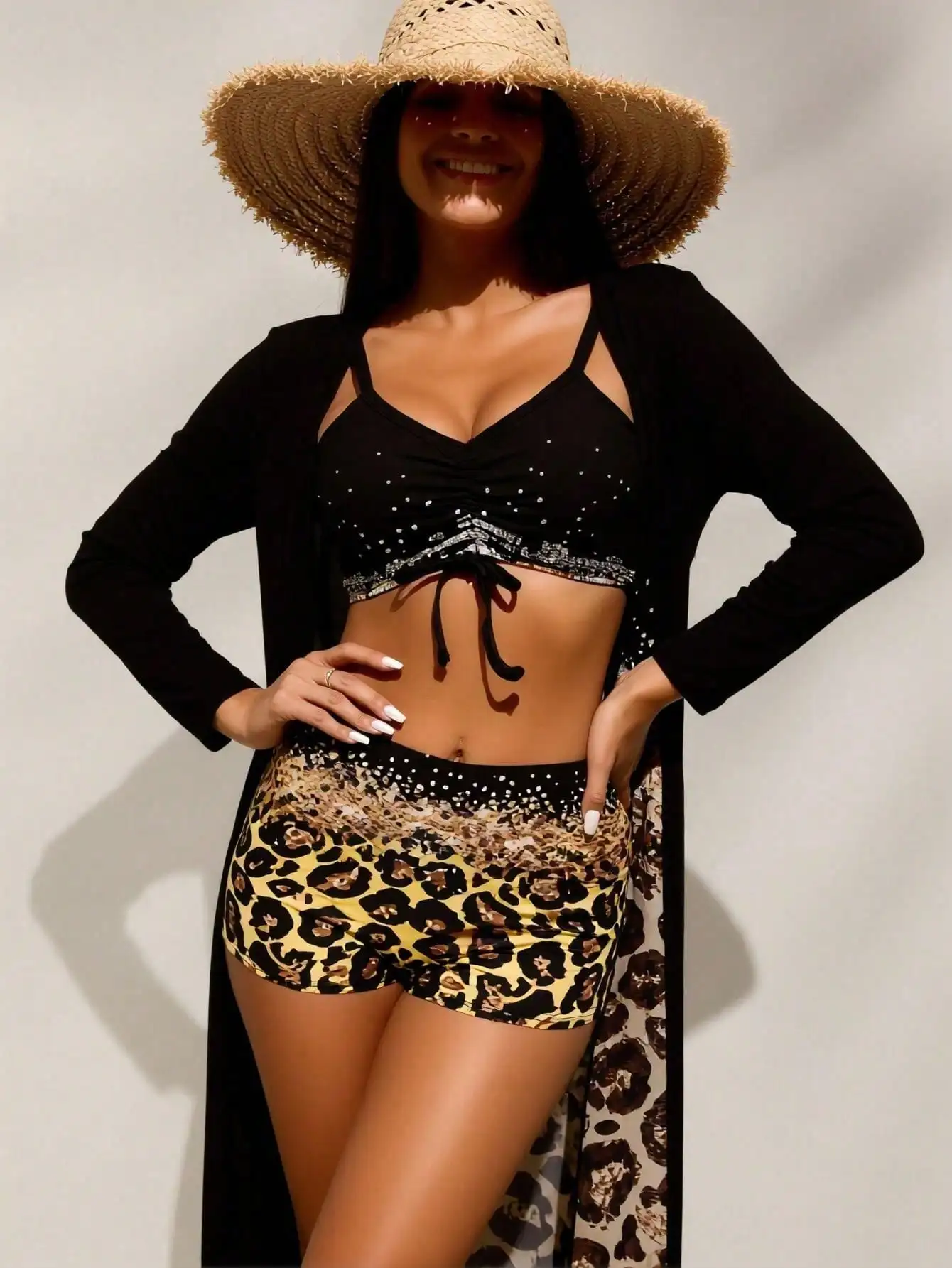 Women's Black Rhinestone Bikini Top & Leopard Print Shorts With Long Black Cover Up
Women's Black Rhinestone Bikini Top & Leopard Print Shorts With Long Black Cover Up