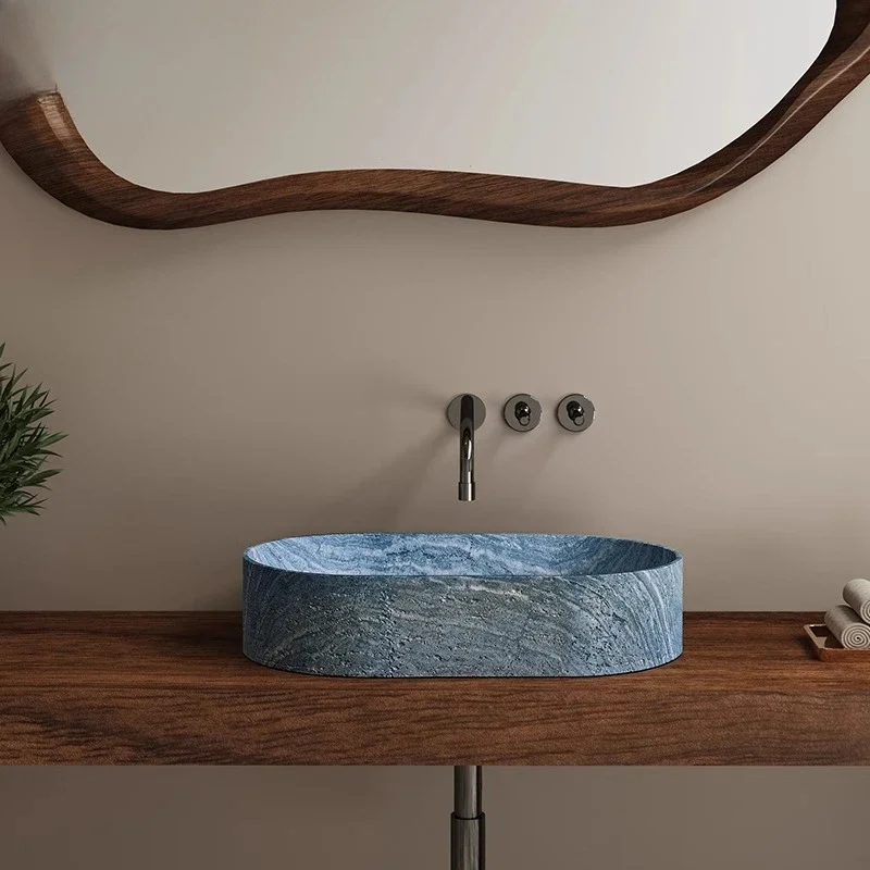 Italian minimalist luxury stone platform basin, designer blue travertine oval wash basin
Italian minimalist luxury stone platform basin, designer blue travertine oval wash basin