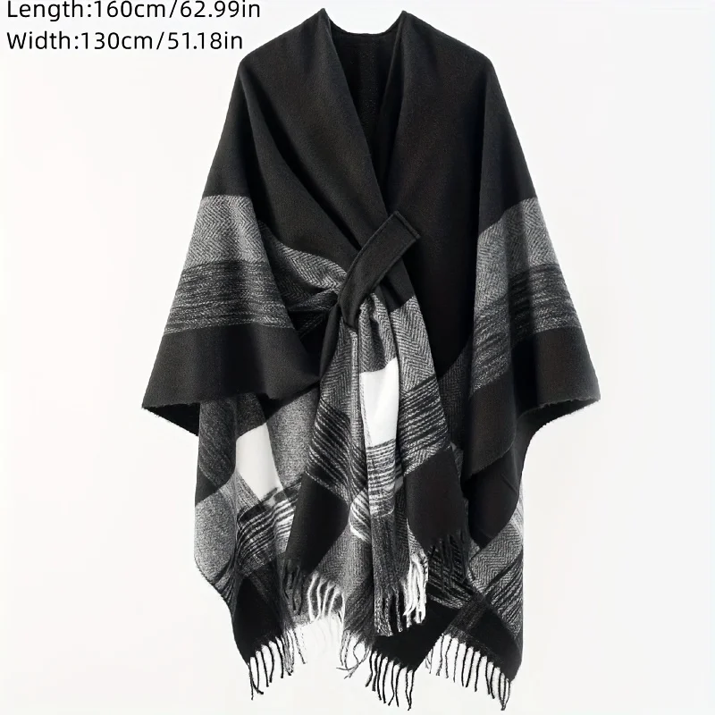 A Women'S Black And White Checkered Tassel Cape Shawl for Spring And Autumn
A Women'S Black And White Checkered Tassel Cape Shawl for Spring And Autumn