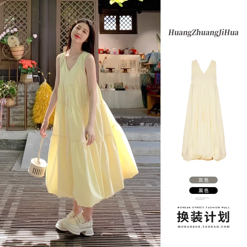 French milk yellow V-neck dress for women's 2024 summer new sleeveless fluffy skirt, medium length loose long skirt
French milk yellow V-neck dress for women's 2024 summer new sleeveless fluffy skirt, medium length loose long skirt