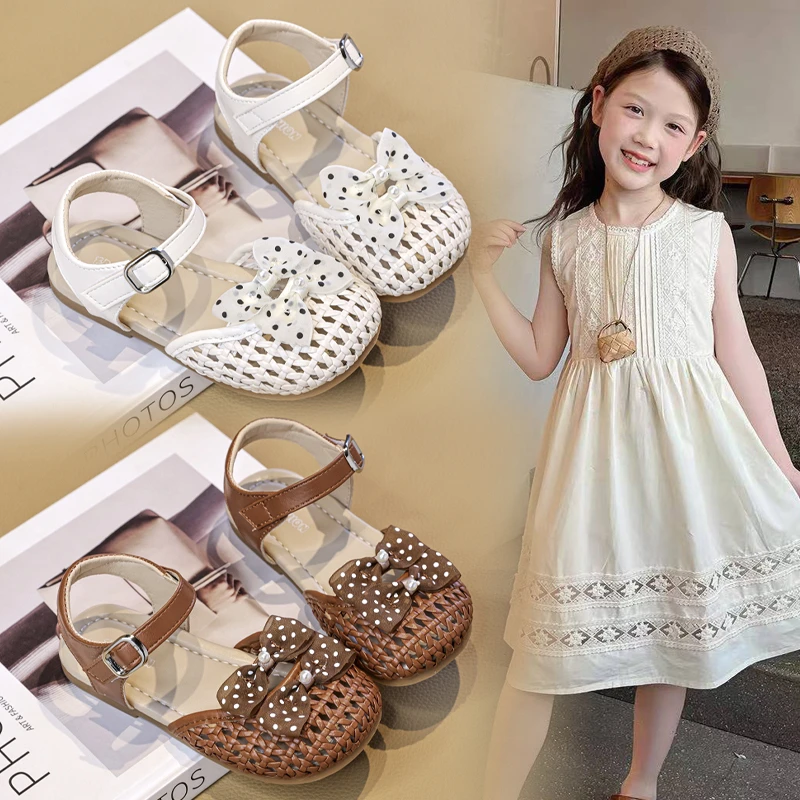 Kids Girls Beach Sandals Polka Dot Bowknot Children Summer Woven Flat Shoes Hollow-out Princess Fashion Toddler Non-slip Sandals
Kids Girls Beach Sandals Polka Dot Bowknot Children Summer Woven Flat Shoes Hollow-out Princess Fashion Toddler Non-slip Sandals