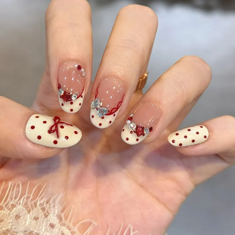 24PCS Sweet Red Polka Dots Short Oval False Nails with Cute Bow Star Rhinestone Shiny French Press on Nails Full Cover Wearable
24PCS Sweet Red Polka Dots Short Oval False Nails with Cute Bow Star Rhinestone Shiny French Press on Nails Full Cover Wearable
