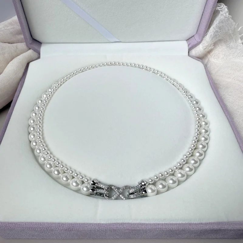 Double-layered for women, niche pearl necklace, collarbone , sweater chain accessory, high-end autumn and wi
Double-layered for women, niche pearl necklace, collarbone , sweater chain accessory, high-end autumn and wi
