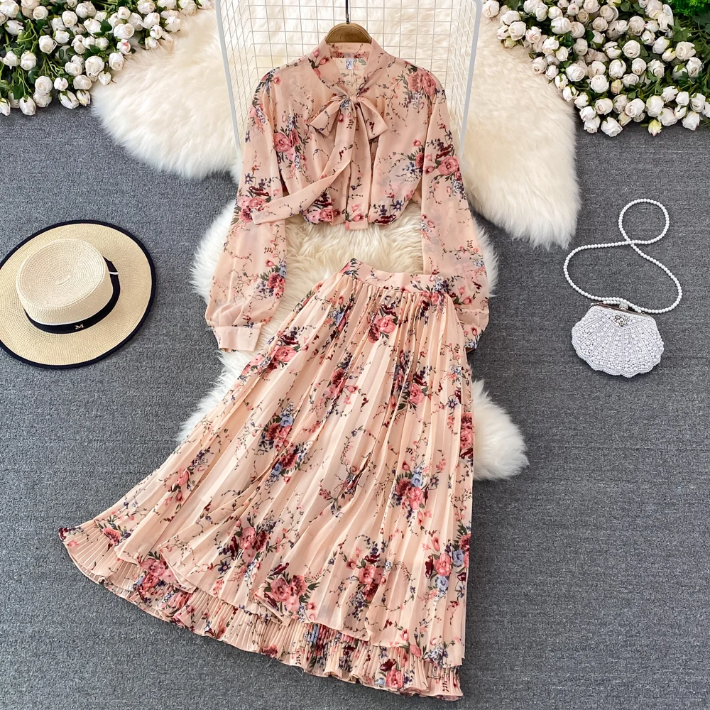 Fashion Set Women's Super Immortal Loose Bow Tied Fragmented Chiffon Shirt Two Piece Set High Waist Pleated Half Skirt Spring
Fashion Set Women's Super Immortal Loose Bow Tied Fragmented Chiffon Shirt Two Piece Set High Waist Pleated Half Skirt Spring
