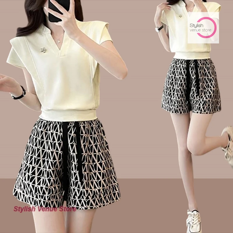 Korean fashion casual sportswear suit women's summer new loose slim Joker V-neck blouse and shorts womens two peice sets
Korean fashion casual sportswear suit women's summer new loose slim Joker V-neck blouse and shorts womens two peice sets