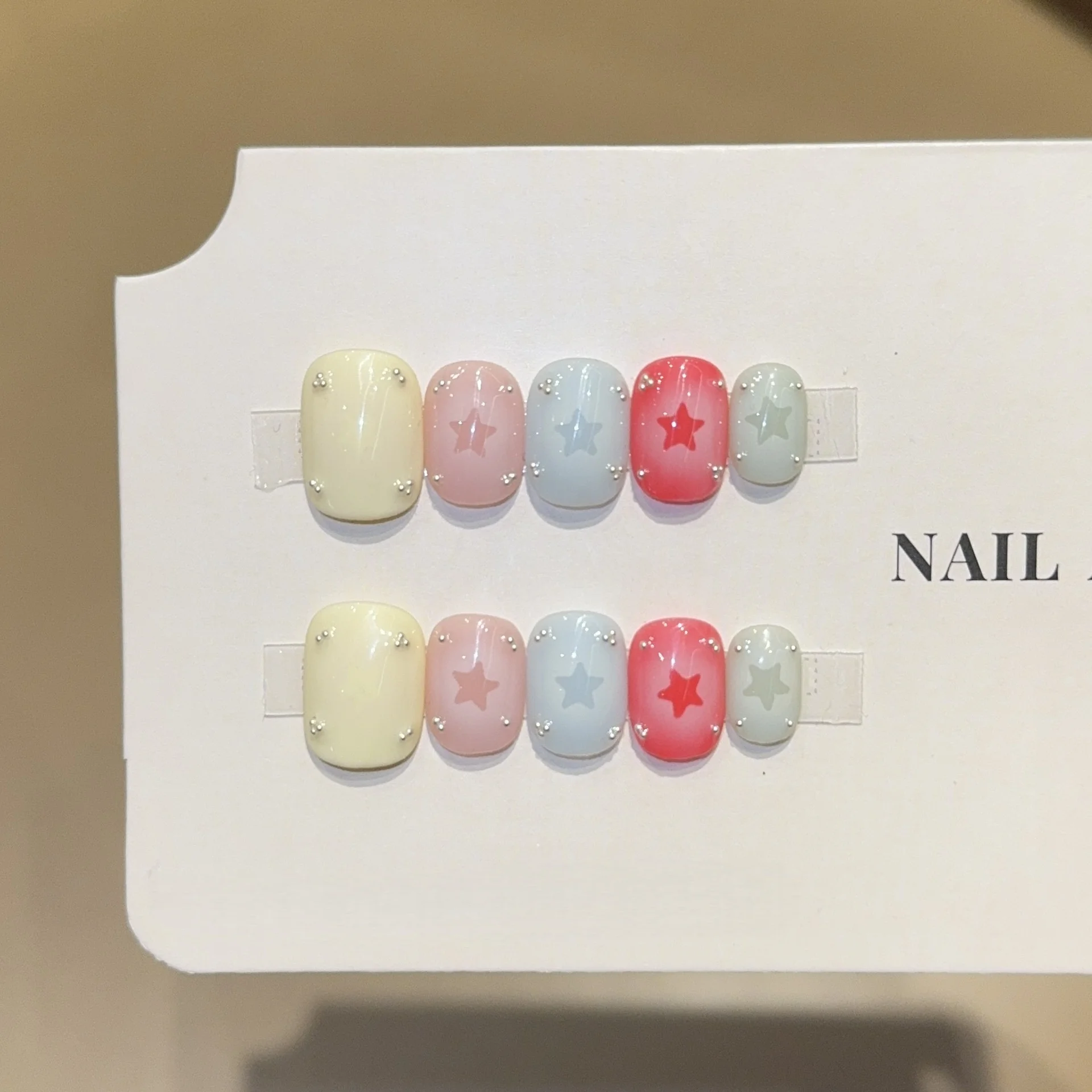 10Pcs Handmade Press On Nails Short Square Fake Nails Pastel Color Star & Rhinestone Full Cover Reusable False Nails for Women
10Pcs Handmade Press On Nails Short Square Fake Nails Pastel Color Star & Rhinestone Full Cover Reusable False Nails for Women