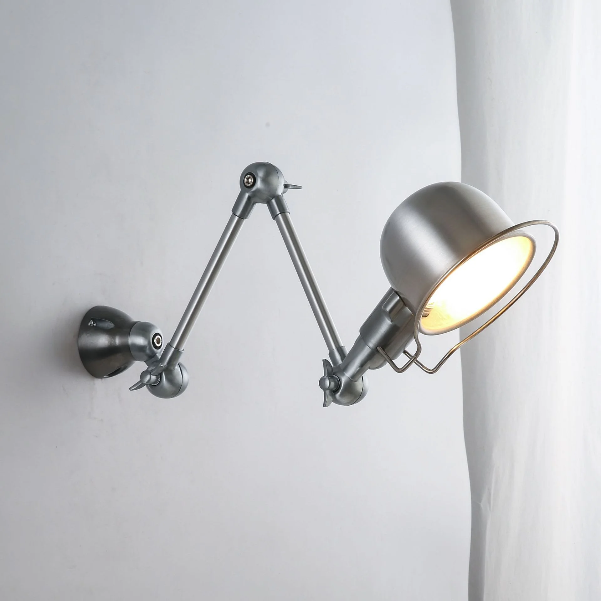 Bauhaus vintage silver wall lamp American Industrial Minimalist table light Bedroom Bedside background Adjustable wall lighting
Bauhaus vintage silver wall lamp American Industrial Minimalist table light Bedroom Bedside background Adjustable wall lighting