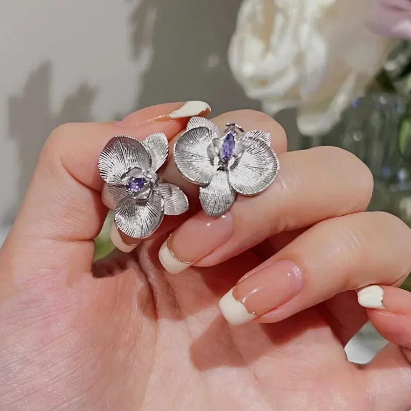 925 silver High quality butterfly orchid flower earrings for women fashion wire drawing purple gem earings stud wedding jewelry
925 silver High quality butterfly orchid flower earrings for women fashion wire drawing purple gem earings stud wedding jewelry