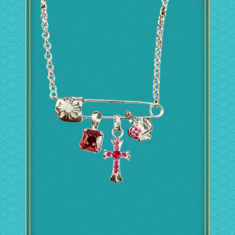 Silver Safety Pin Necklace: Ruby Red Gem & Crystal Cross Charms
Silver Safety Pin Necklace: Ruby Red Gem & Crystal Cross Charms
