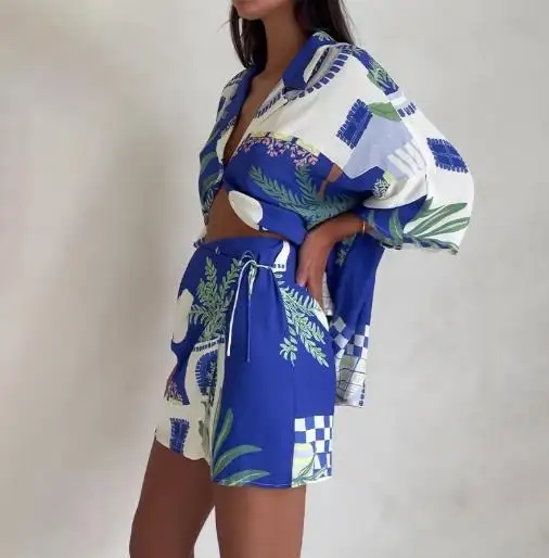 Two Piece Set Women Outfit 2025 Summer Fashion Graffiti Turn-Down Collar Short Sleeve Shirt & Casual High Waist Shorts Set 
Two Piece Set Women Outfit 2025 Summer Fashion Graffiti Turn-Down Collar Short Sleeve Shirt & Casual High Waist Shorts Set
