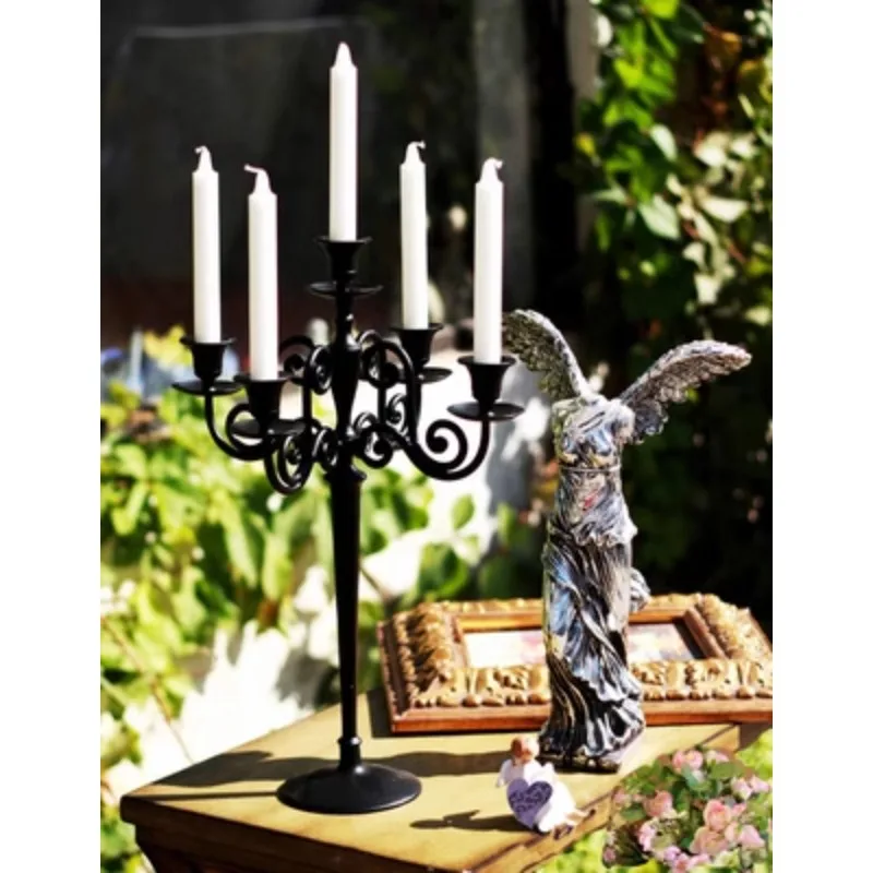 Wrought iron candle holder, candle holder with five heads, special ornament for Valentine's Day in restaurants and hotels
Wrought iron candle holder, candle holder with five heads, special ornament for Valentine's Day in restaurants and hotels
