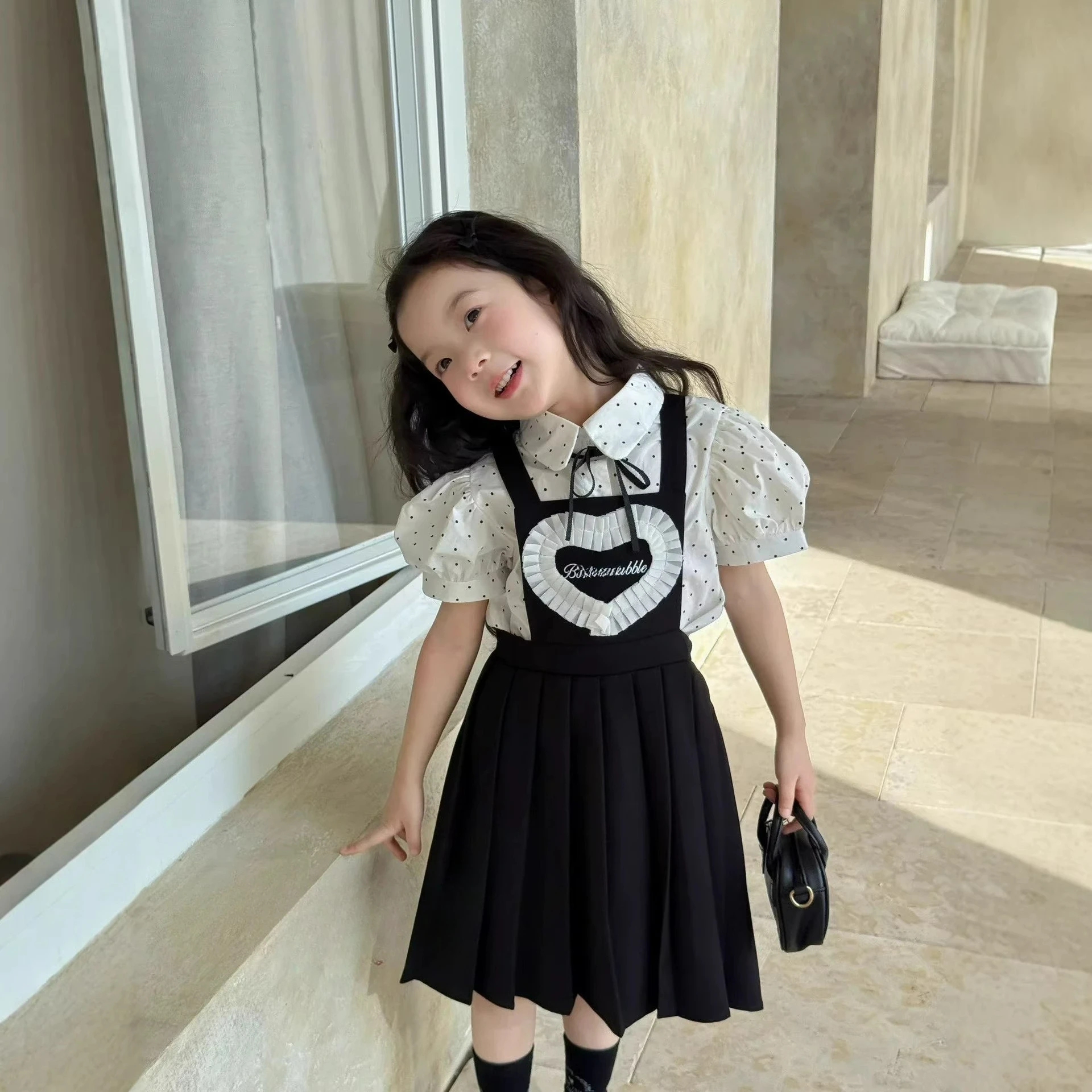 Girls' Sweet Campus Style Set Summer Children's Dot Short Sleeved Shirt+Strap Skirt Two Piece Set 2-8 Years Old
Girls' Sweet Campus Style Set Summer Children's Dot Short Sleeved Shirt+Strap Skirt Two Piece Set 2-8 Years Old