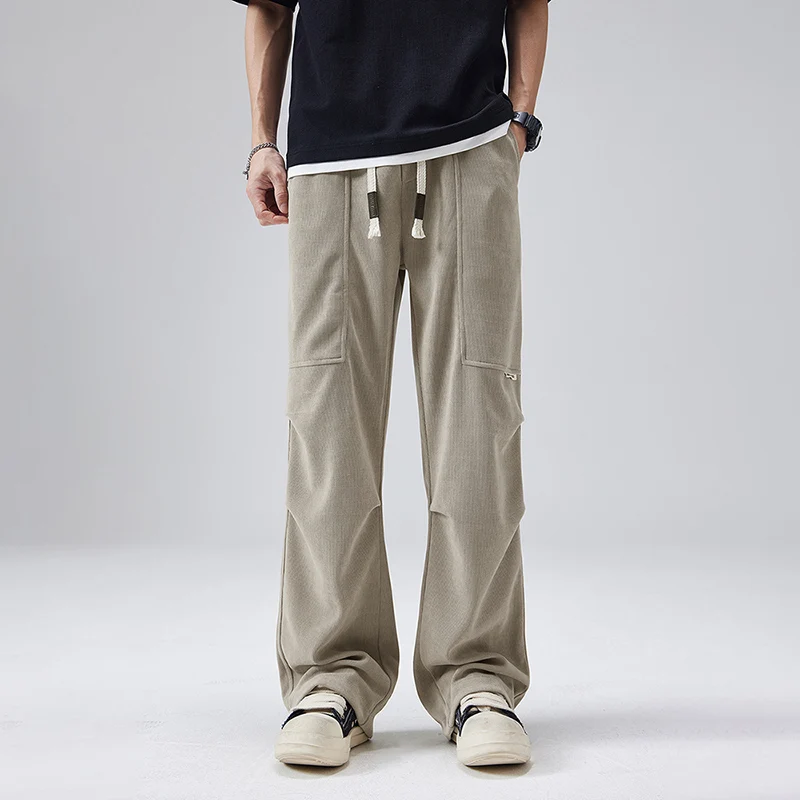 Модные повседневные мужские брюки прямого кроя, весенне-осенние, новые, универсальные, свободного кроя, американские длинные брюки, японские свободные брюки
Модные повседневные мужские брюки прямого кроя, весенне-осенние, новые, универсальные, свободного кроя, американские длинные брюки, японские свободные брюки