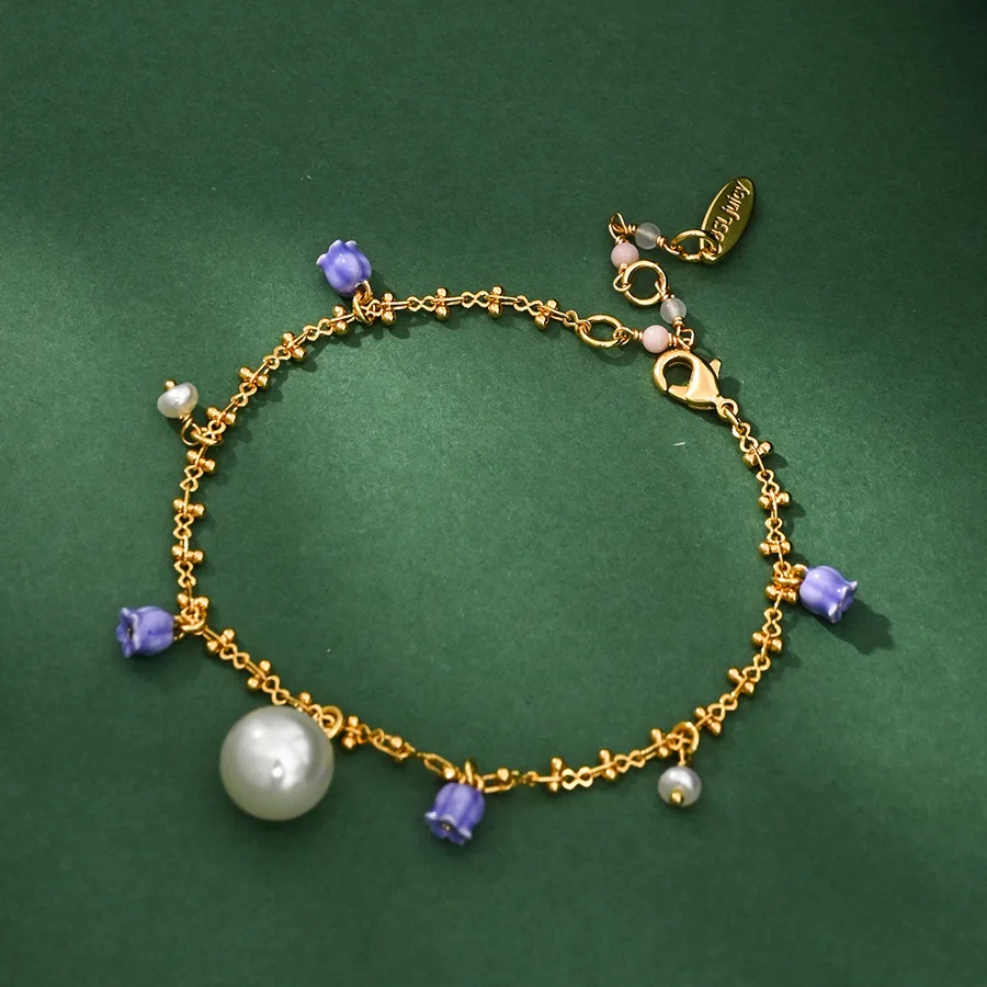2026 New Spring Summer Style Fairy Style Enamel Glaze Purple Lily of the Valley Pearl Tassel Pendant Bracelet Bell Hand Jewelry
2026 New Spring Summer Style Fairy Style Enamel Glaze Purple Lily of the Valley Pearl Tassel Pendant Bracelet Bell Hand Jewelry