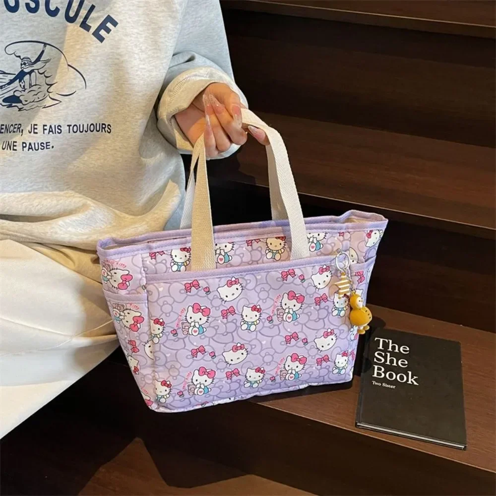 Sweet Kawaii Anime Sanrio Ins Fashion Large Capacity Portable Handbag Cute Hello Kitty Students Commuting Bag Gifts for Girls
Sweet Kawaii Anime Sanrio Ins Fashion Large Capacity Portable Handbag Cute Hello Kitty Students Commuting Bag Gifts for Girls